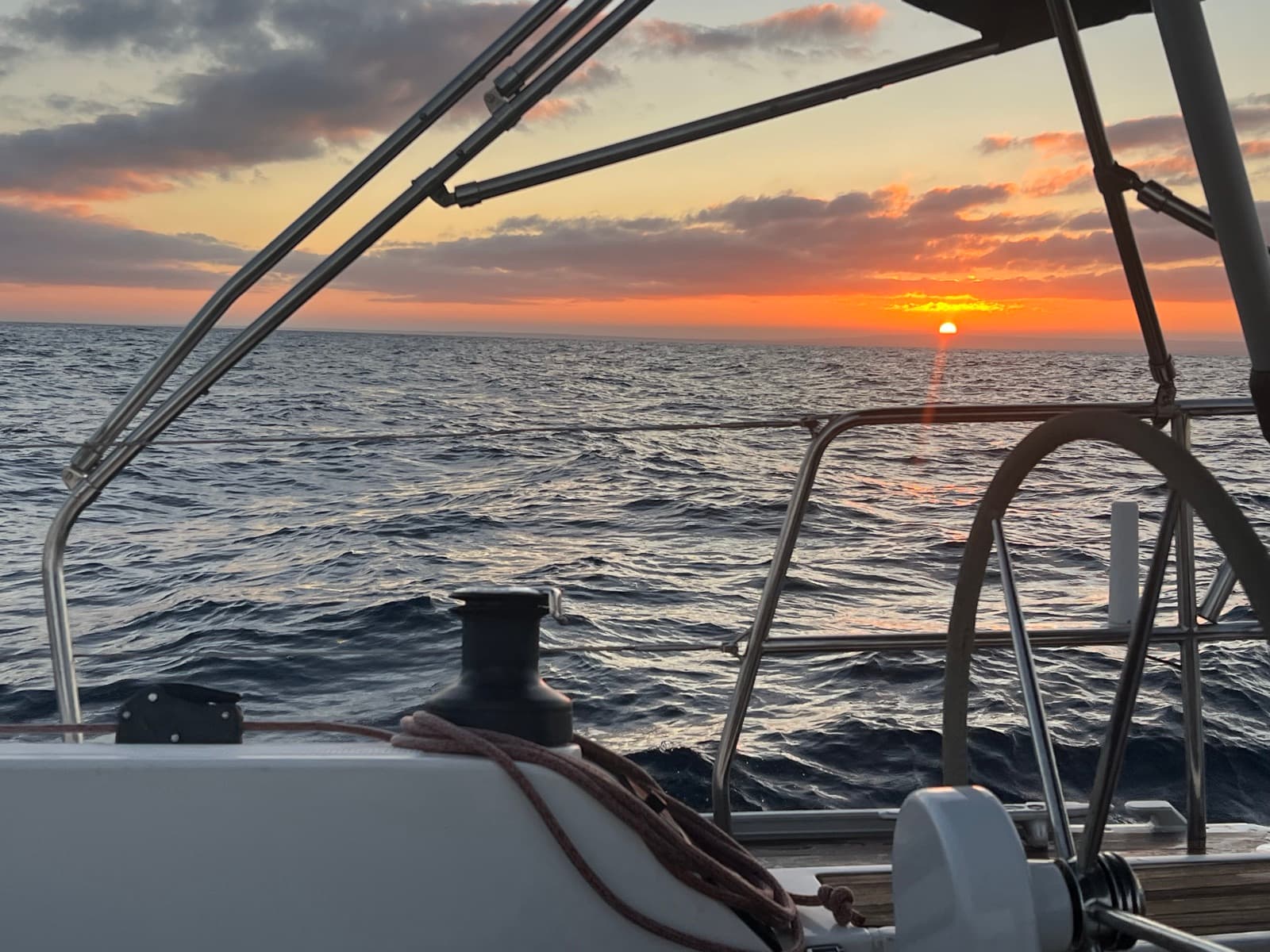 Sun setting over the open Atlantic seen from the cockpit
